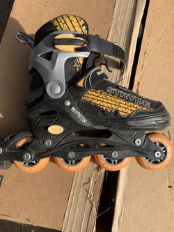 Black and orange rollerblades like new great condition
