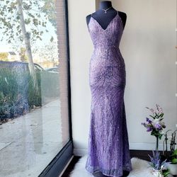 NEW Georgeous Lavender mermaid PROM/ PARTY maxi dress with glittery and patterned sequins open cross body back spaghetti straps, moderate stretch.  

