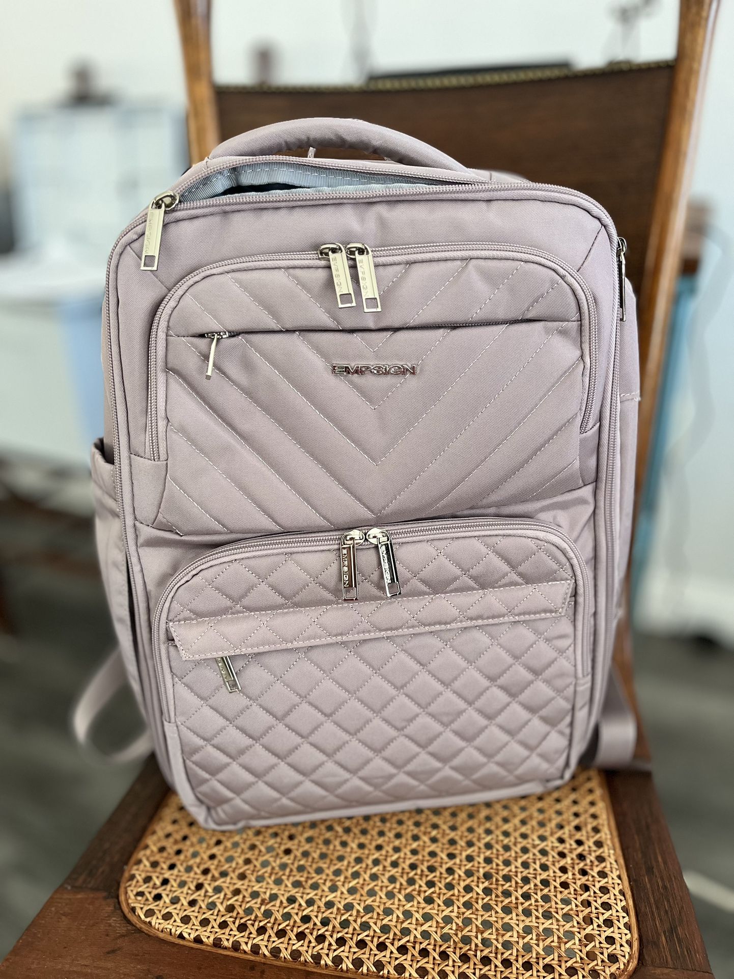 Backpack. Plane. Travel. Spacious. Beautiful soft pink.