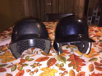 2 baseball helmets