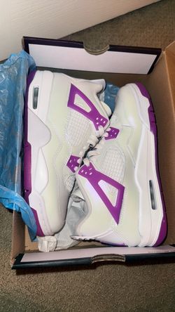 Purple and white Jordan 4s