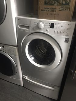 Front load washer with stand