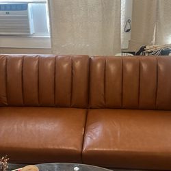 Brown leather futon couch