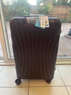 Brand new medium size hard shell suitcase