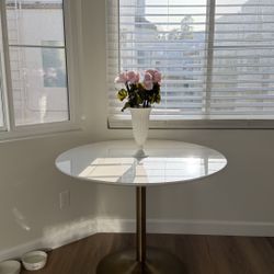 CB2 WHITE TULIP TABLE WITH BRASS BASE 