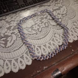 It's a blue and silver diamond chain