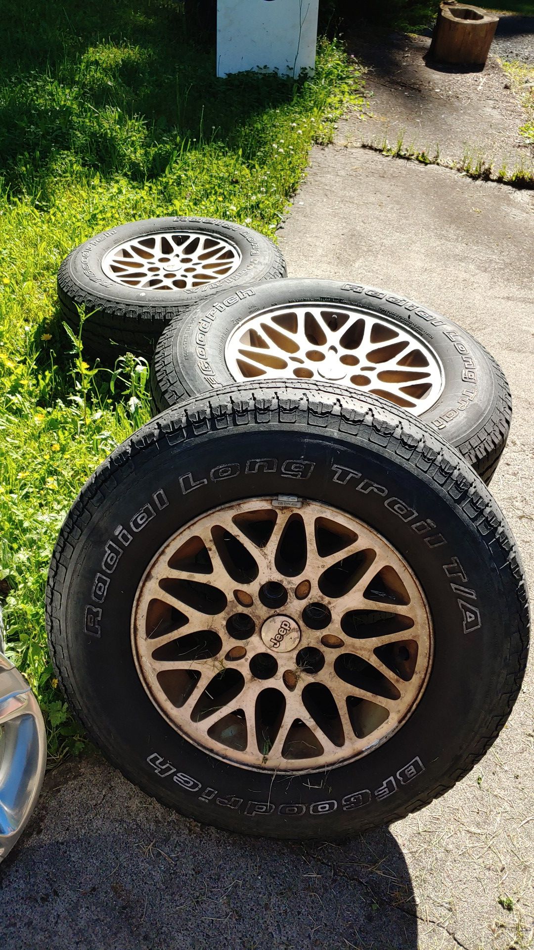 Set of four Jeep Wheels and Tires Tires are weathered