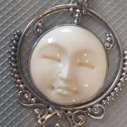 Carved Moon Face Pendant 