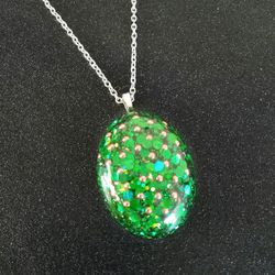 Green copper bb and iron orgonite oval shaped pendant on 20" silver necklace 