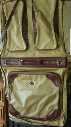 Vintage brown suit luggage folds