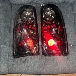 99-07 Chevy Silverado Tail Lights New Never Used Still Wrapped 