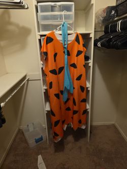 Read listing- Fred flintstone costume