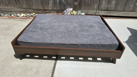 Raised dog bed frame with mattress