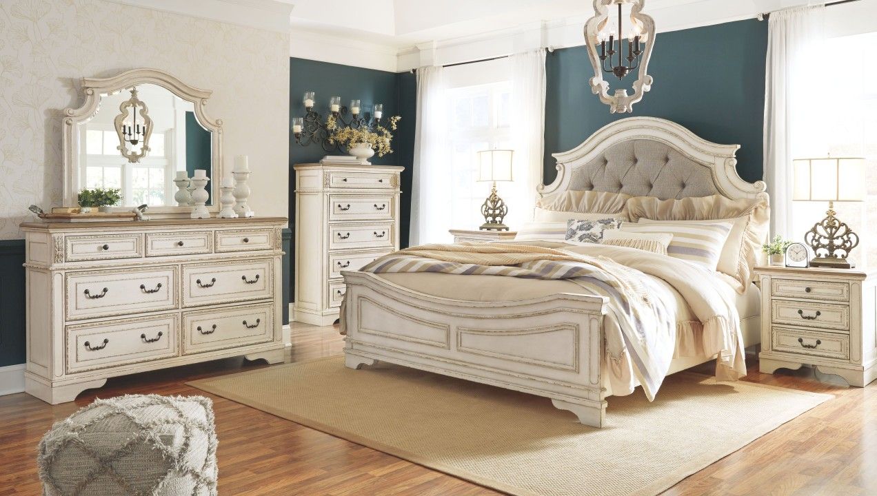 Realyn-Two-tone-7Pc.Dresser-Mirror-Queen Upholstered Panel Bed-2 Nightstands