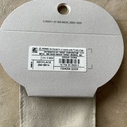 Necklace distributed by Target Corporation. Origin: China.