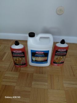 Hardwood cleaner and 2 bottles of hardwood polish and restorer