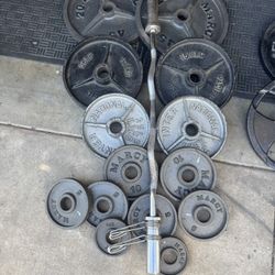 Olympic curling bar with 255lbs of Olympic weights