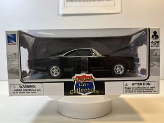 1969 Dodge Charger Diecast Model Car: 1/25 Scale, New In the Box By New Ray