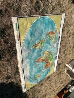 Very large 1972 wall map measures 5’ x 8’ made in Germany. Great for a man cave or an educational situation. Good quality With minimal tears, suitable