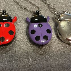 NECKLACE WATCHES - $12 each - NEW - MULTICOLOR LADYBUGS