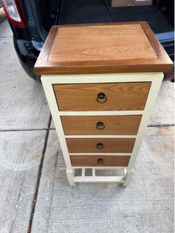 Four drawer chest dresser- stand alone piece light color frame w/wood accents