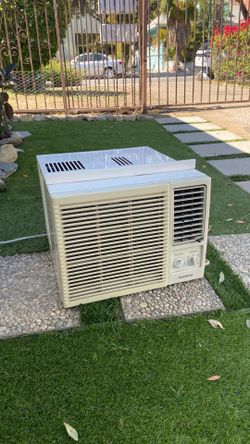 Air conditioner working very good  comes with side winds  7500 BTU ice cold air