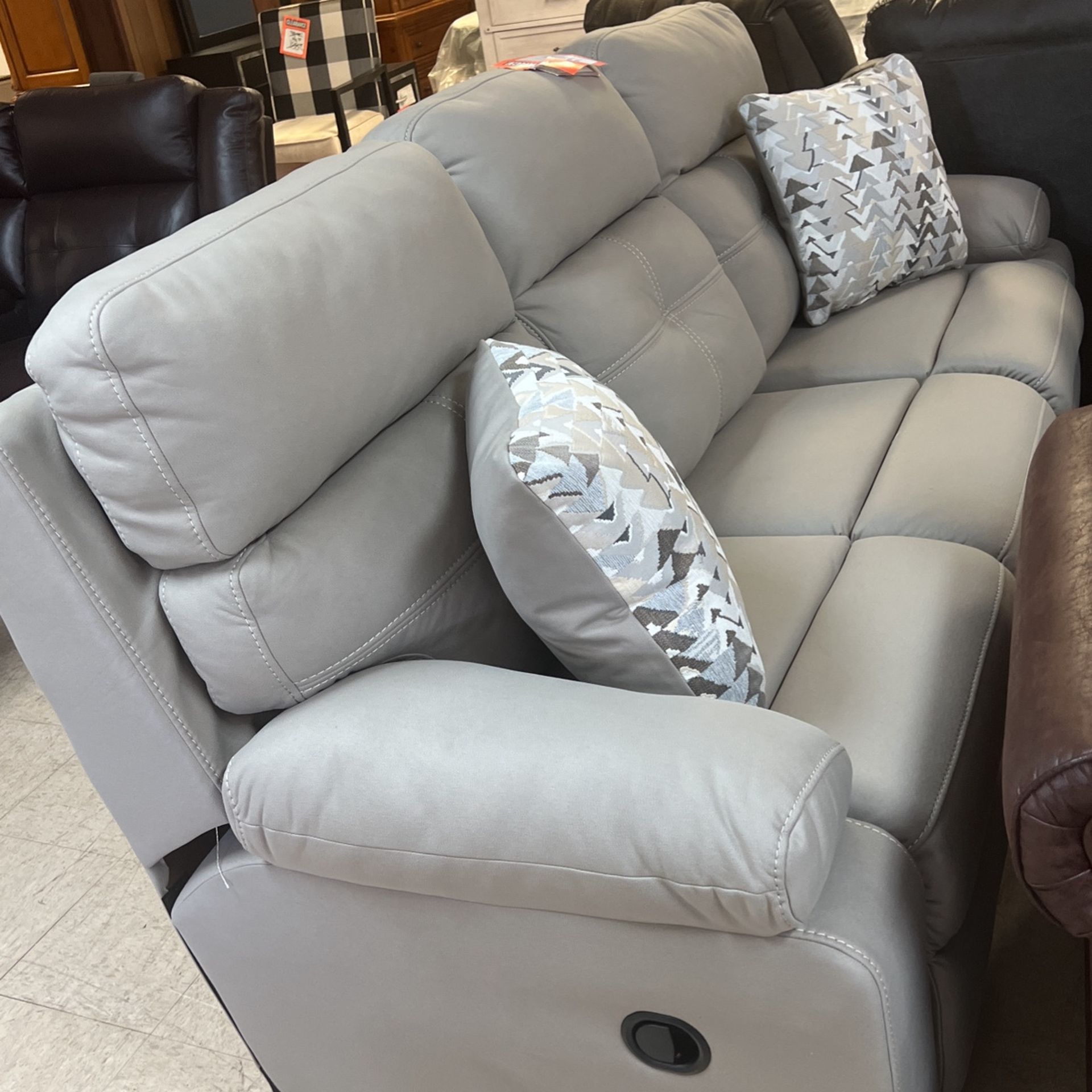 Three-piece reclining group reclining sofa, reclining loveseat, and reclining chair for $2000