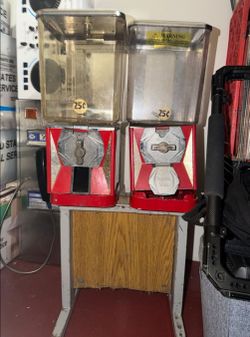 OLD SCHOOL TOY VENDING MACHINES. COMES WITH STAND. ASKING $70 OR BEST OFFER.