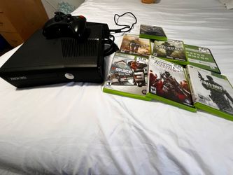 Xbox 360 with 8 games