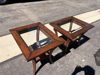 Used wood-and-glass end tables