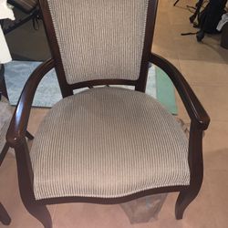 2 brown wooden chairs. Sturdy lightly used 