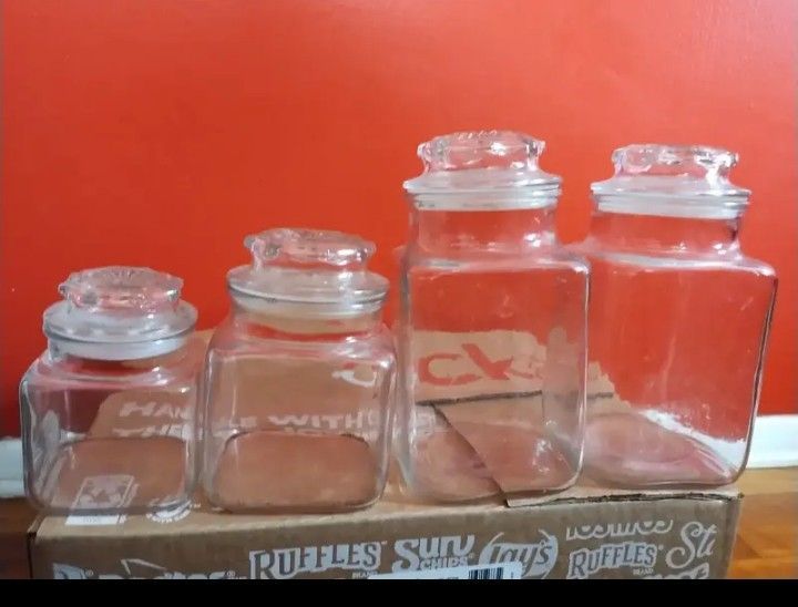 4 - GLASS STORAGE JARS .