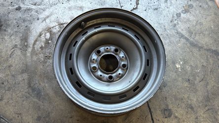 One 15x6.5 Inch steel Rally Wheel For a Chevy Or GMC Truck or Van C10, G10, G20