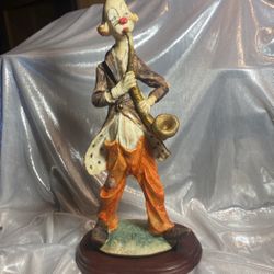 Vintage hobo clown with wooden base