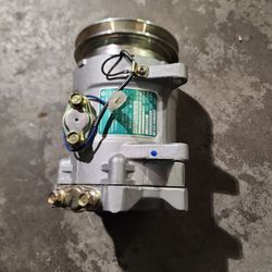 1982...1983  NISSAN central AC COMPRESSOR  NEW NEVER USED $ 100 