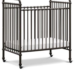 Brand New Iron Mini Crib With New Mattress 