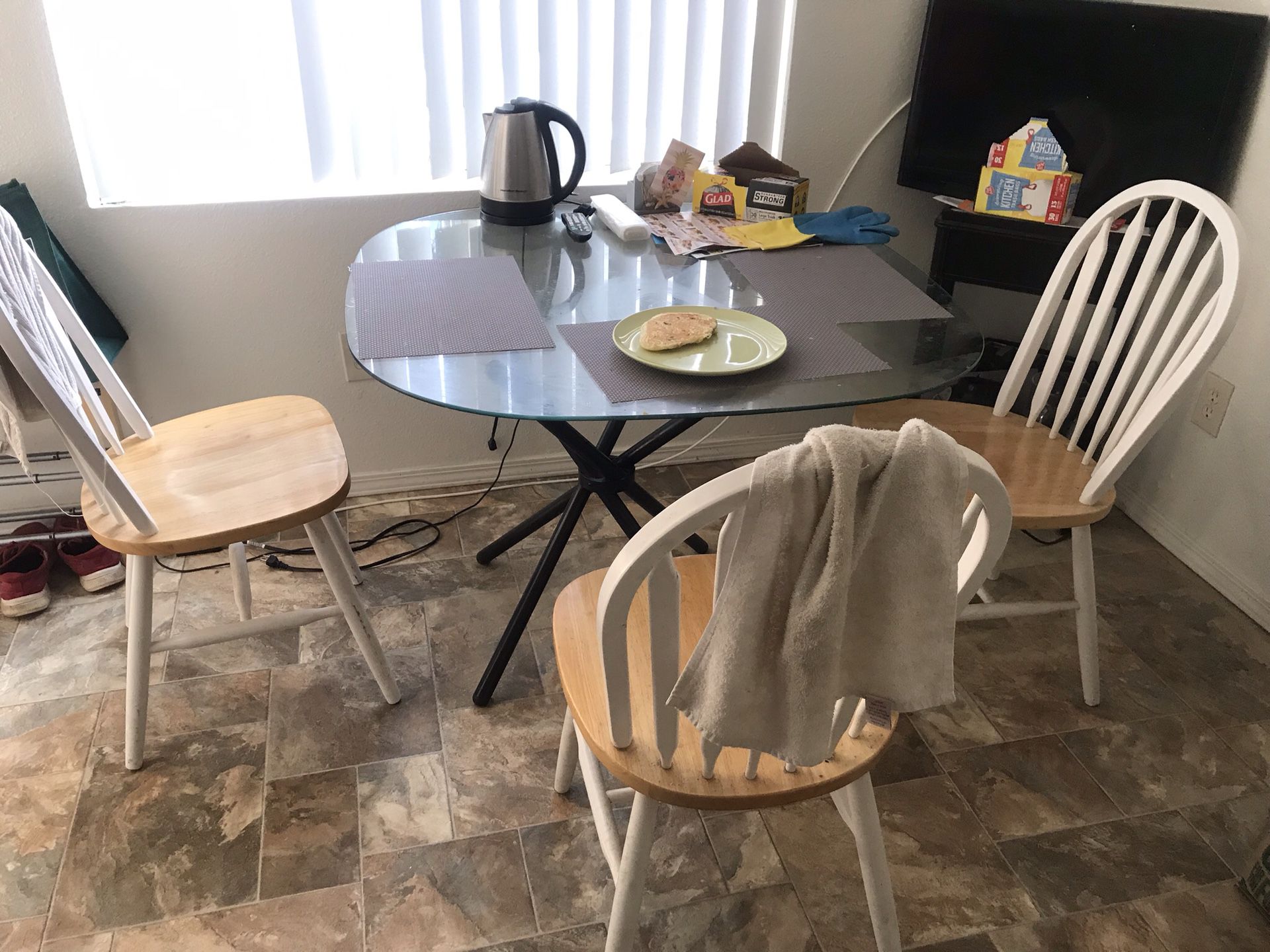 Kitchen glass table with 3 wood chairs