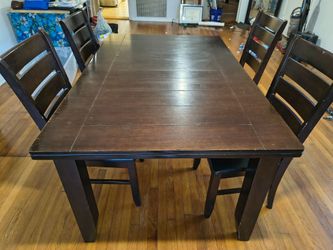 Dark Cherry Wood dining room table with 4 chairs