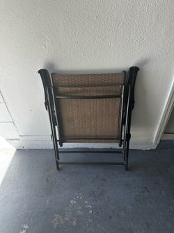 Brown folding chairs