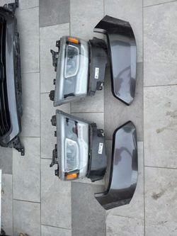 Pair of OEM Headlights with Fender Flares