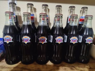 Collectible Coca-Cola and Pepsi bottles