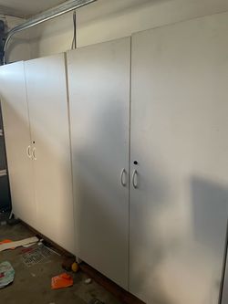 White double door storage closet cabinet