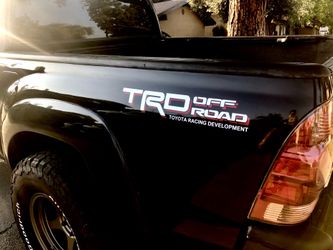 Toyota TRD OFF-ROAD Side Panel Vinyl Sticker. White with Grey or Red outline. 19” in total length. Available in different colors and design.