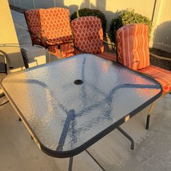 Gently Used Glass Table And 4 Chairs