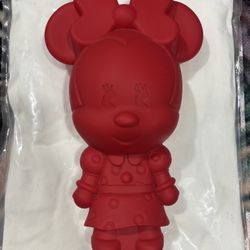 This is a Disney Store Retired Red MXYZ Minnie Mouse Silicone Pencil Case