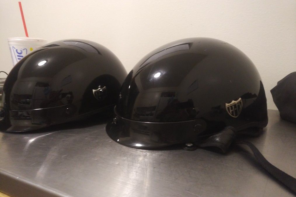 2 Harley Davidson half helmets with visor size med.