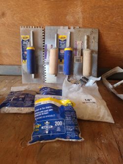Tile and floor adhesive