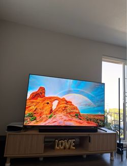 TCL 65” QLED 4K Smart TV and TV stand separately