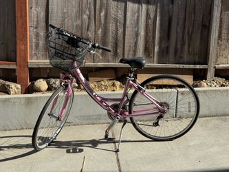 Beautiful pink bike with basket
