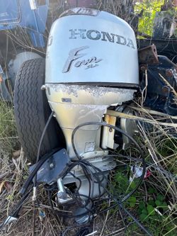 90 hp Honda outboard starts and runs good took off Boat for re-power